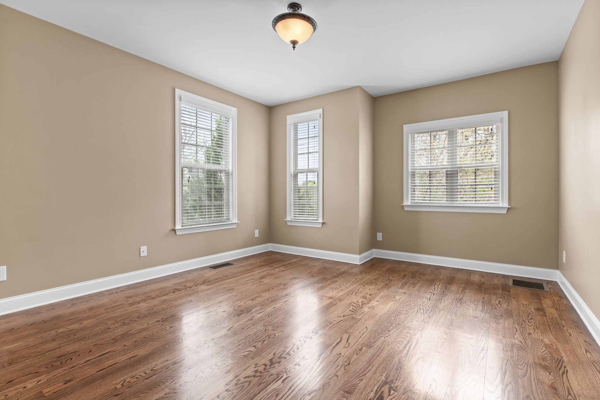 161 Chester Stevens Road Franklin, TN 37067 - Photo 23 of 37 a view of an empty room with wooden floor and a window