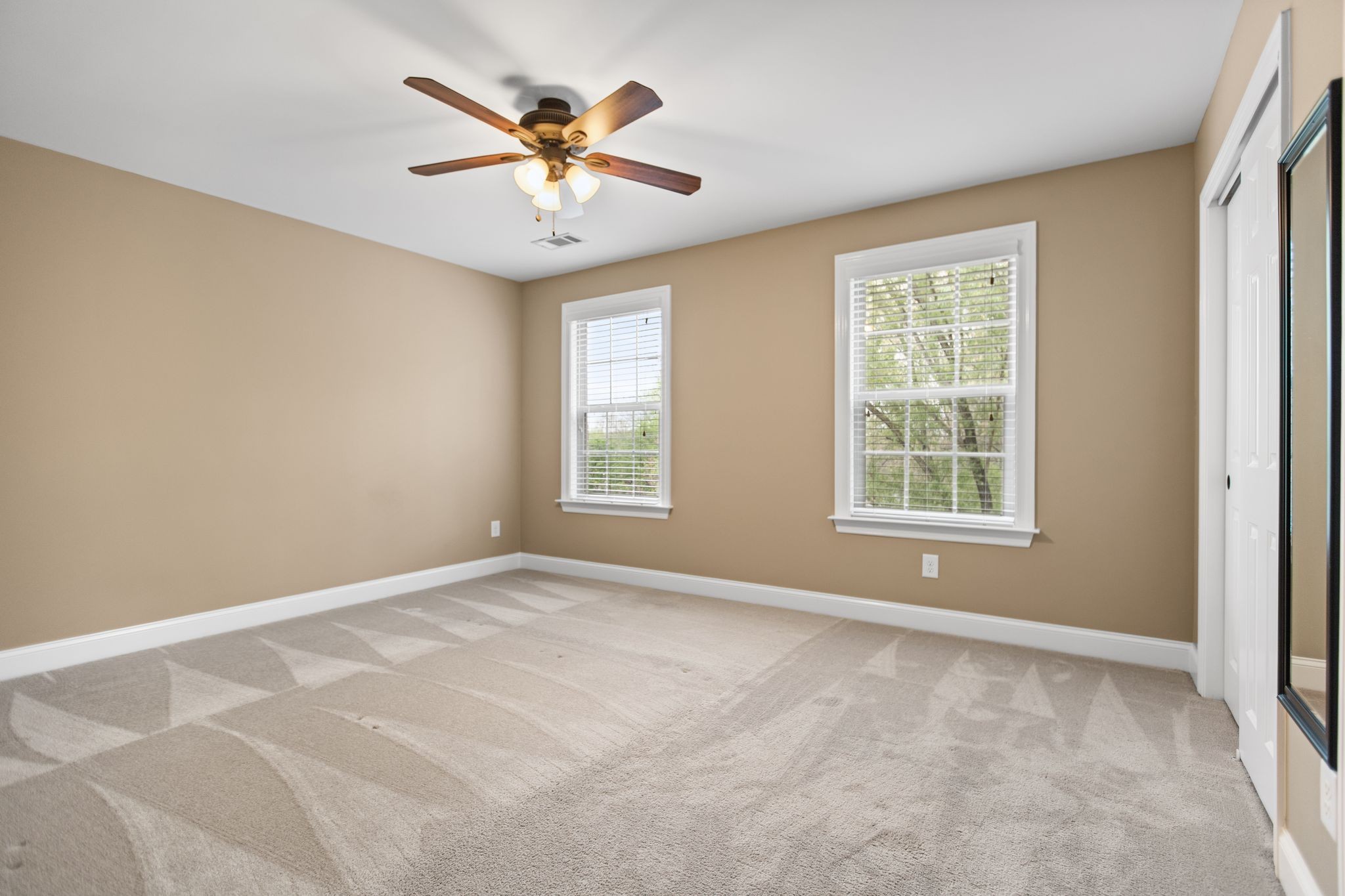 161 Chester Stevens Road Franklin, TN 37067 - Photo 29 of 37 an empty room with window and ceiling fan