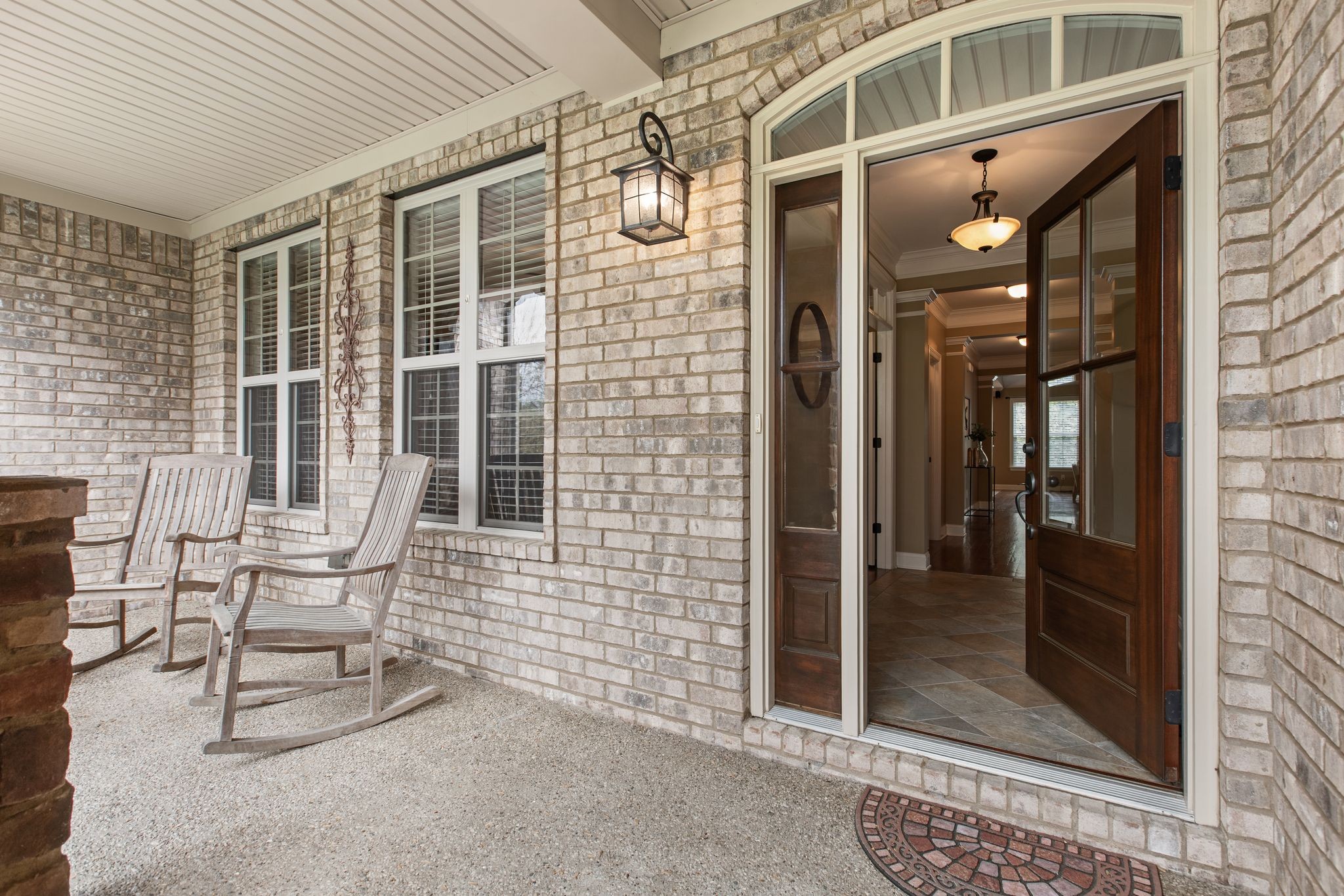 161 Chester Stevens Road Franklin, TN 37067 - Photo 3 of 37 a view of a porch with a table and chairs