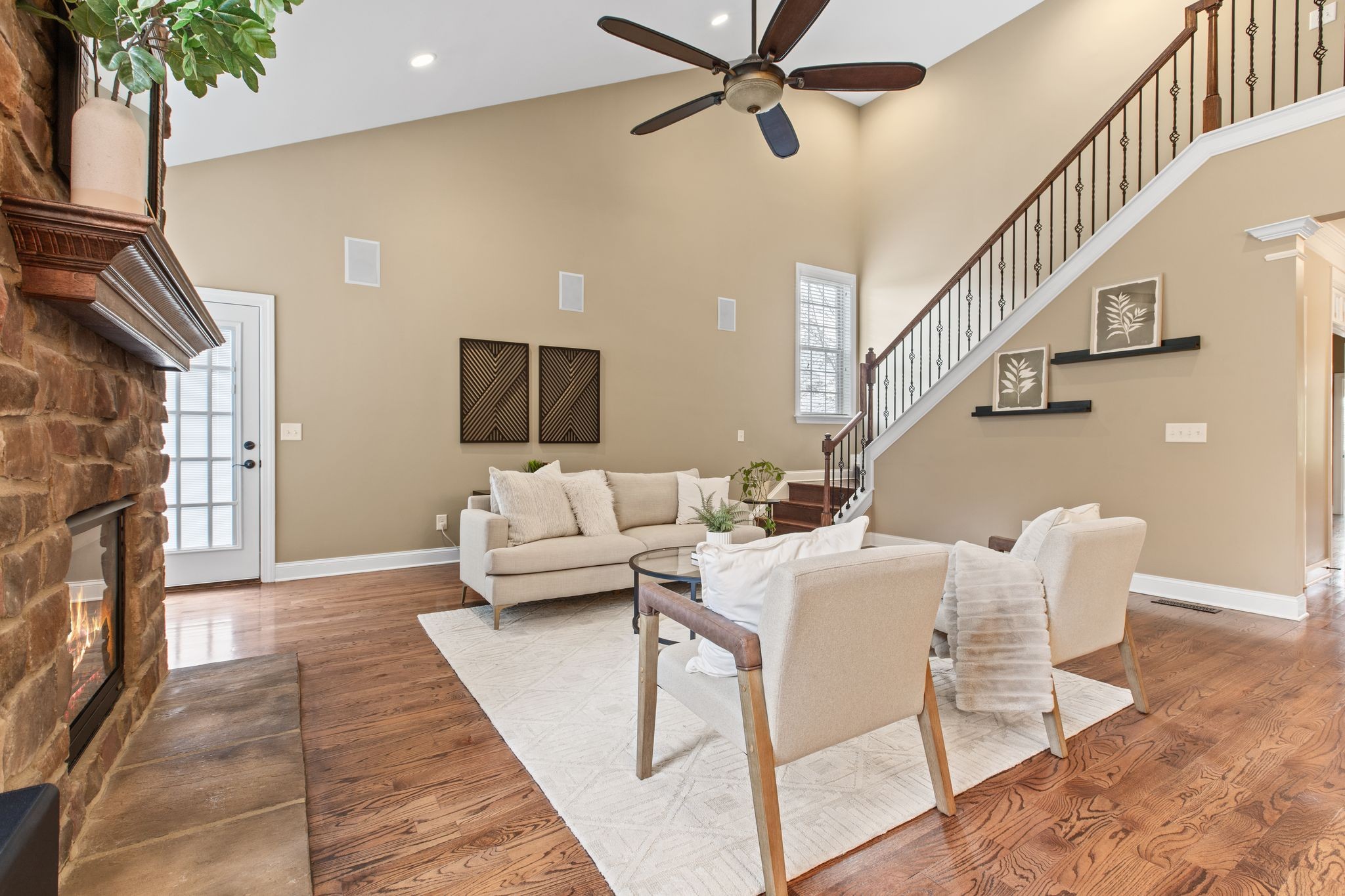 161 Chester Stevens Road Franklin, TN 37067 - Photo 7 of 37 a living room with fireplace furniture and a potted plant