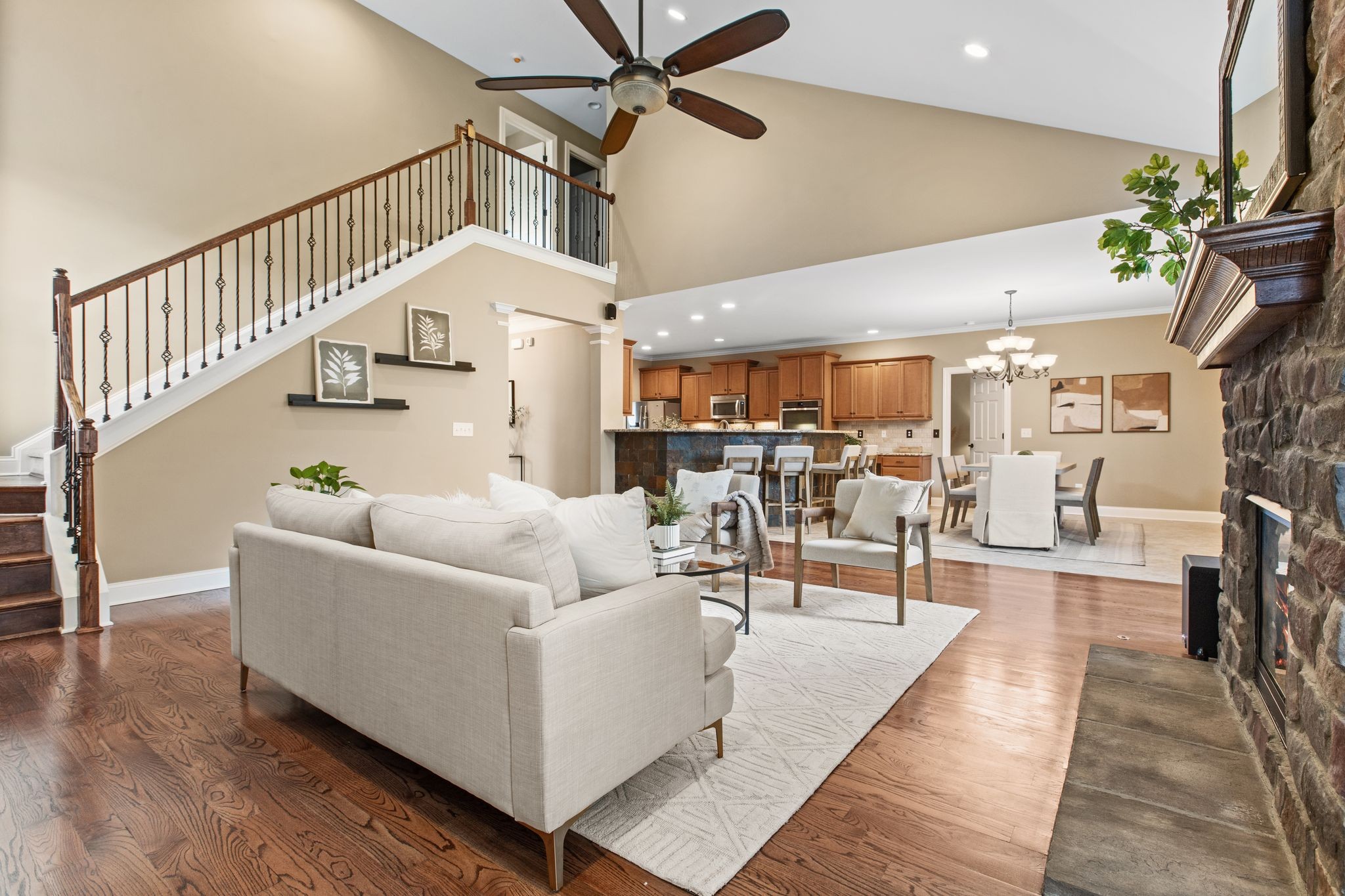 161 Chester Stevens Road Franklin, TN 37067 - Photo 8 of 37 a living room with furniture kitchen view and a chandelier