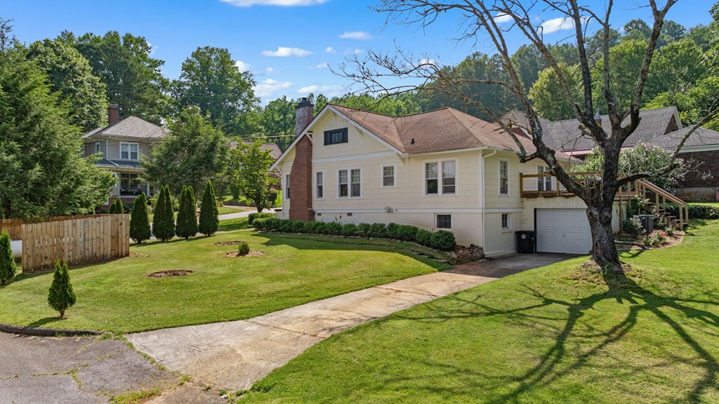 46 Dillard Street Murphy, NC 28906 - Photo 18 of 73 a front view of a house with a yard and trees