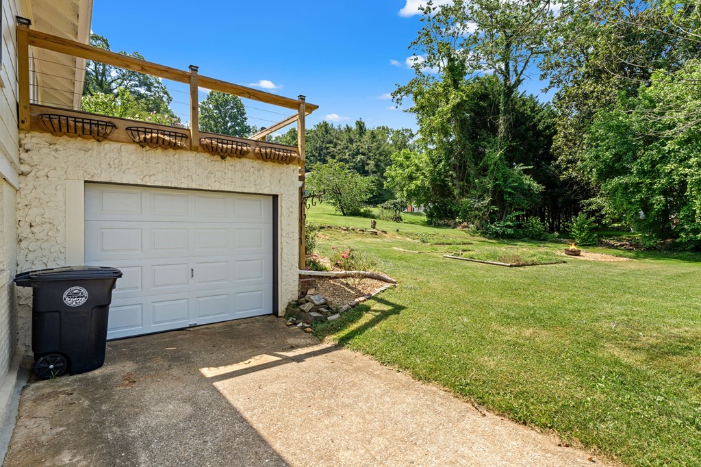46 Dillard Street Murphy, NC 28906 - Photo 35 of 73 a view of a wooden door and a yard