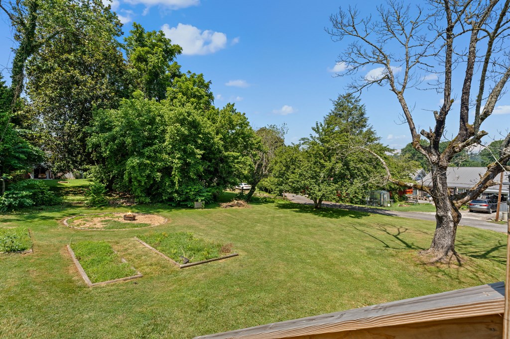 46 Dillard Street Murphy, NC 28906 - Photo 42 of 73 a view of a tennis ground with large trees
