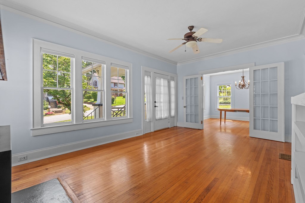 46 Dillard Street Murphy, NC 28906 - Photo 45 of 73 a view of an empty room with window and wooden floor