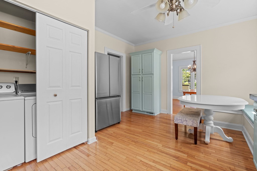 46 Dillard Street Murphy, NC 28906 - Photo 49 of 73 a view of a dining room with furniture a chandelier and wooden floor