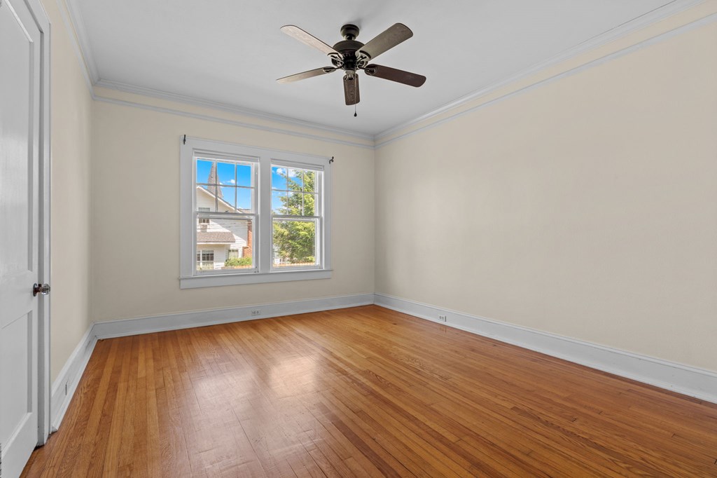 46 Dillard Street Murphy, NC 28906 - Photo 54 of 73 an empty room with wooden floor and windows