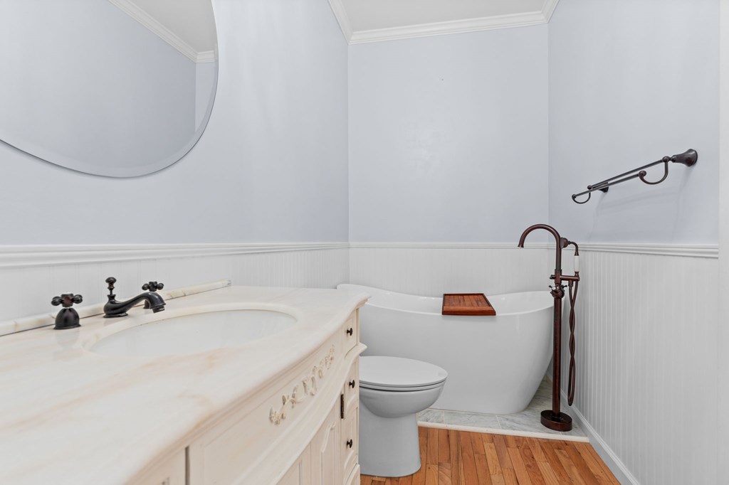 46 Dillard Street Murphy, NC 28906 - Photo 60 of 73 a bathroom with a sink and a toilet