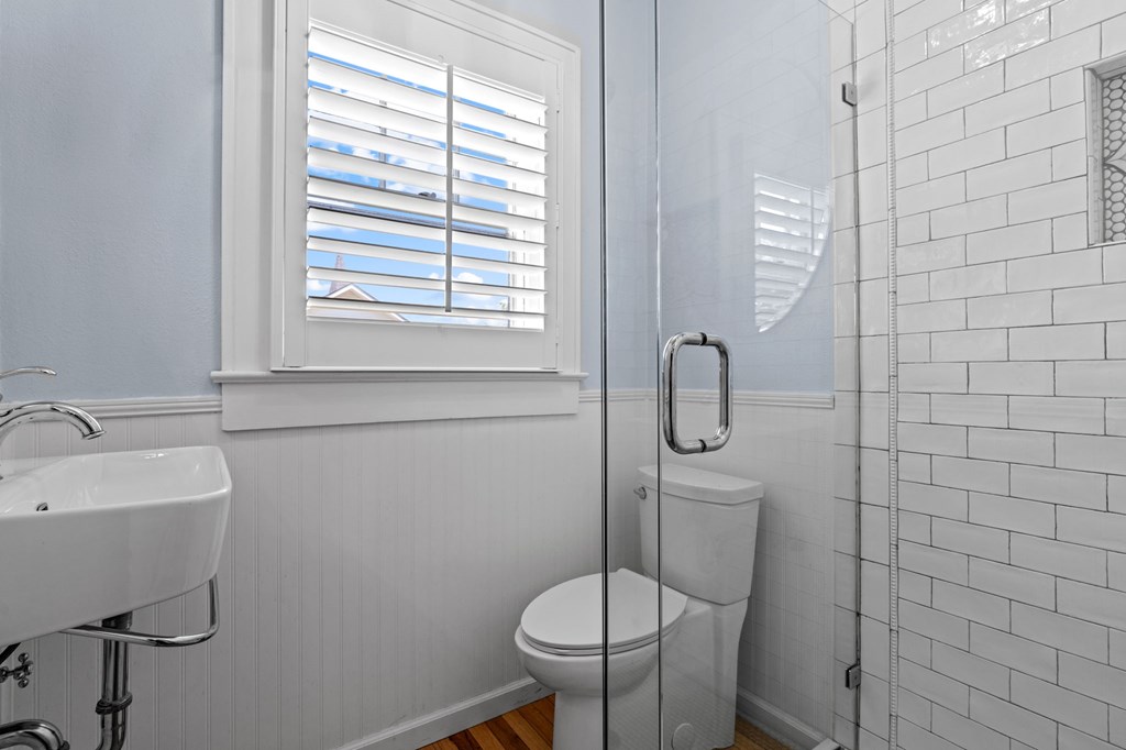 46 Dillard Street Murphy, NC 28906 - Photo 62 of 73 a bathroom with a sink toilet and a window