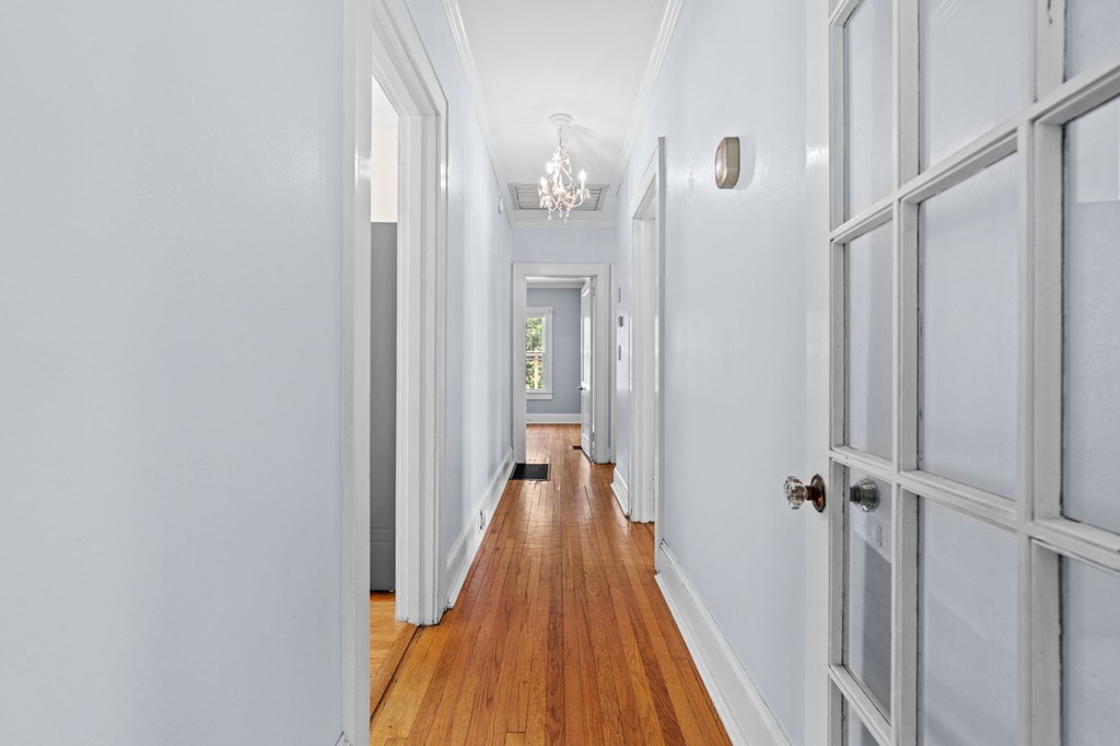 46 Dillard Street Murphy, NC 28906 - Photo 66 of 73 a view of a hallway with wooden floor and staircase