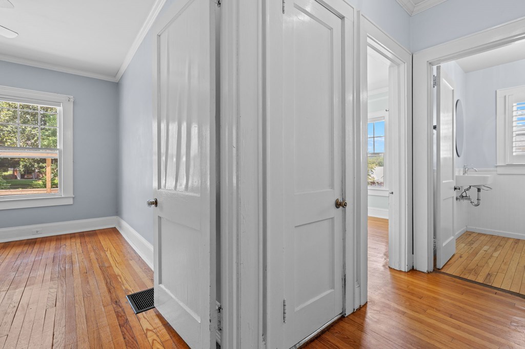 46 Dillard Street Murphy, NC 28906 - Photo 67 of 73 a view of a bedroom with wooden floor and windows