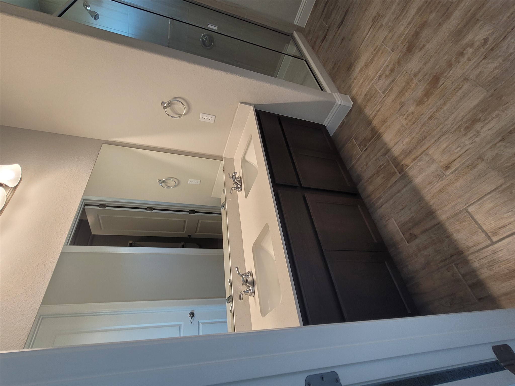 120 Free Stone Drive Georgetown, TX 78628 - Photo 13 of 40 Dual vanities with sleek countertops elevate this well-appointed bathroom.