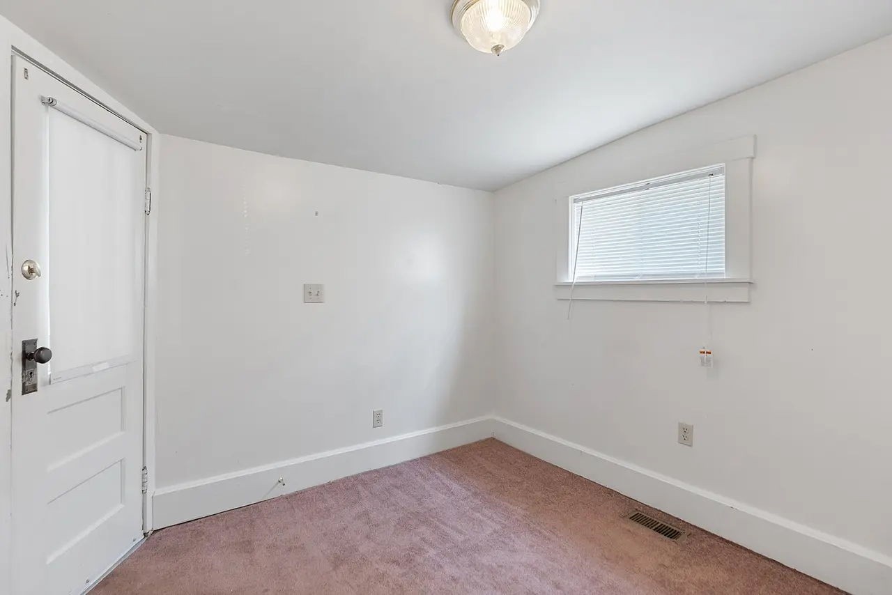 702 Richard Street Springfield, TN 37172 - Photo 14 of 15 a view of a small space with wooden floor and a window