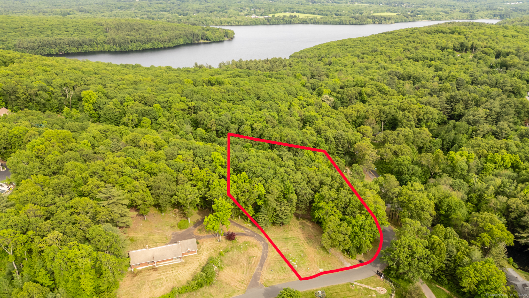 2 Setting Sun Trail Ellington, CT 06029 - Photo 6 of 7 a view of a yard with an outdoor space