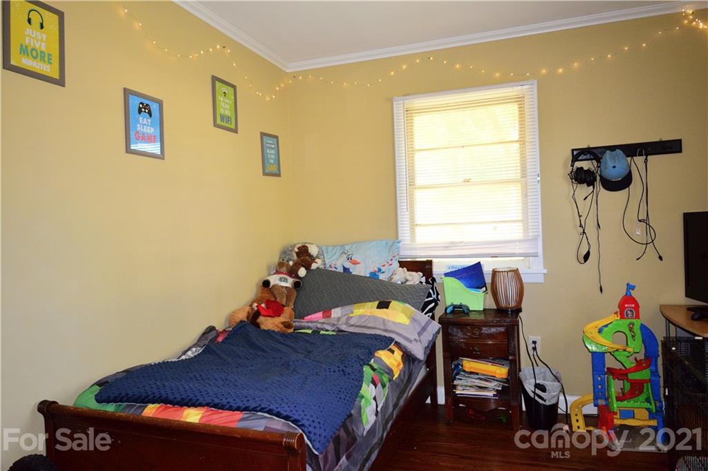 5357 Old Beatty Ford Road Rockwell, NC 28138 - Photo 11 of 14 a bed room with a bed and a chair