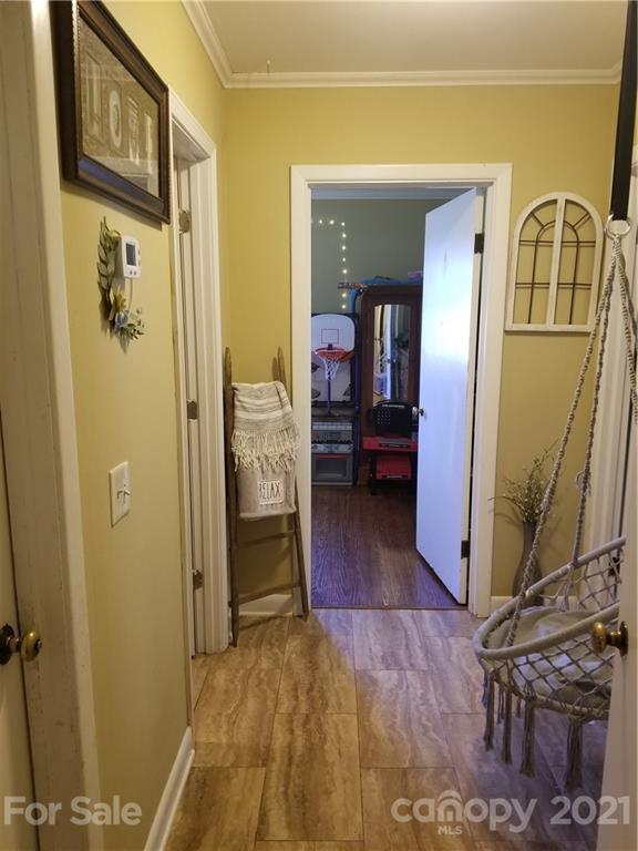 5357 Old Beatty Ford Road Rockwell, NC 28138 - Photo 12 of 14 a view of a bedroom from a hallway