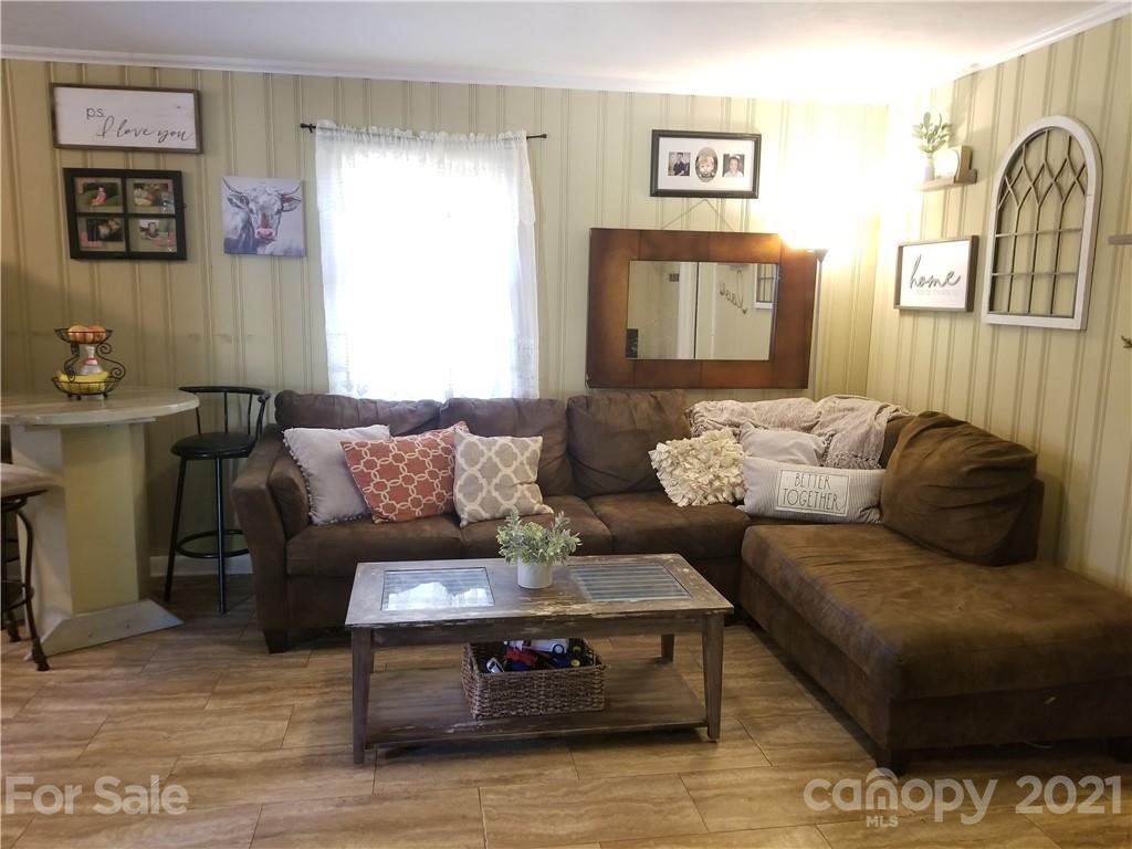 5357 Old Beatty Ford Road Rockwell, NC 28138 - Photo 4 of 14 a living room with furniture and a window