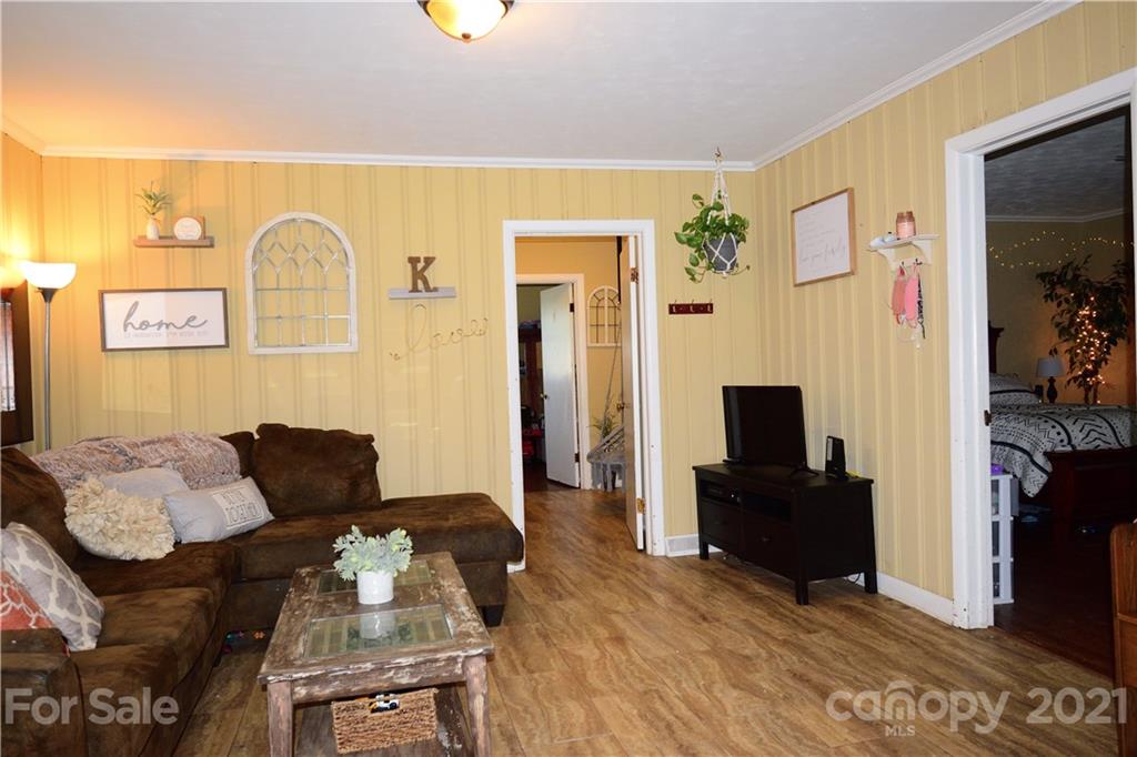 5357 Old Beatty Ford Road Rockwell, NC 28138 - Photo 6 of 14 a living room with furniture and a flat screen tv