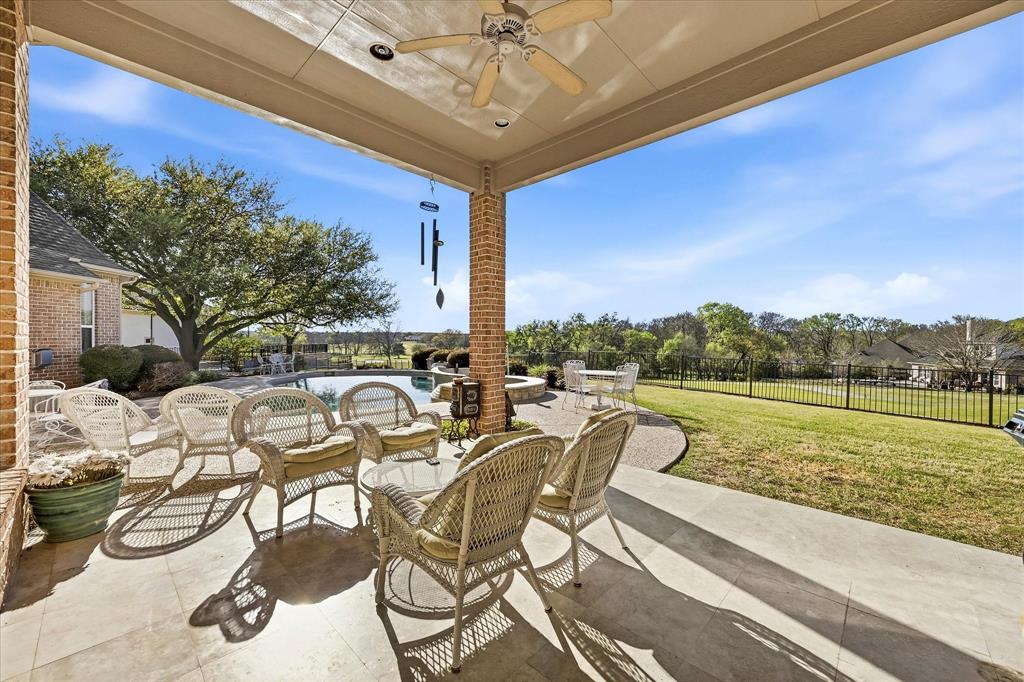2109 Twilight Point Heath, TX 75032 - Photo 29 of 31 large covered pation downstairs overlooking pool & Golf Course