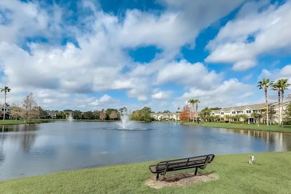 a view of a lake with a big yard