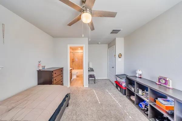 a room with furniture and a chandelier