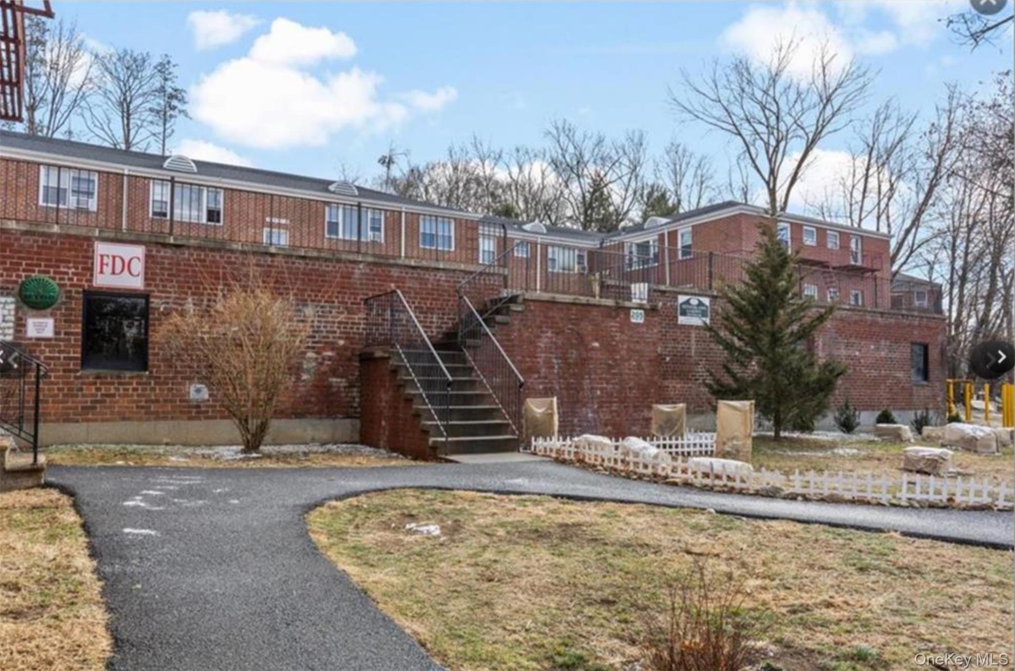 205 West Post Road, Unit 2H White Plains, NY 10606 - Photo 7 of 7 View of property's community featuring stairway