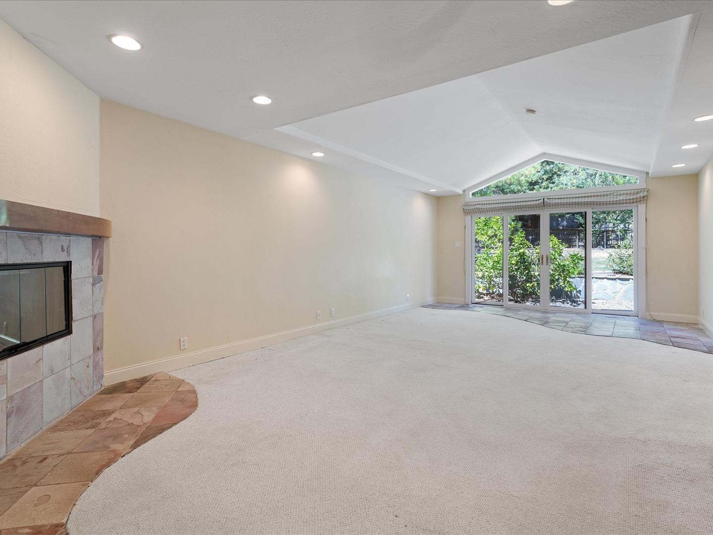1395 Cañada Road Woodside, CA 94062 - Photo 14 of 36 a view of an empty room with a window
