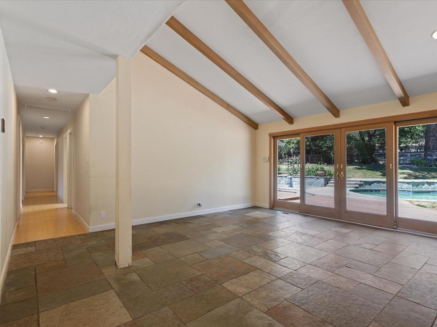 1395 Cañada Road Woodside, CA 94062 - Photo 8 of 36 a view of an empty room with a window