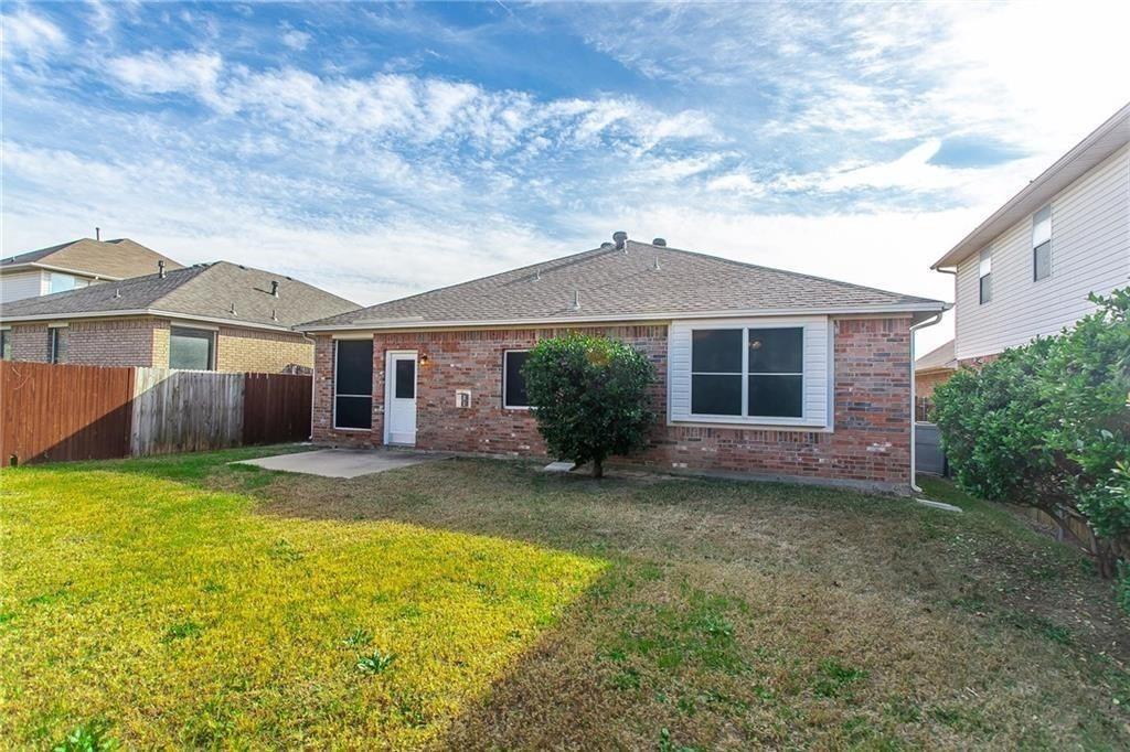 3817 Summersville Lane Fort Worth, TX 76244 - Photo 12 of 18 a view of a yard in front of a house with plants and large tree