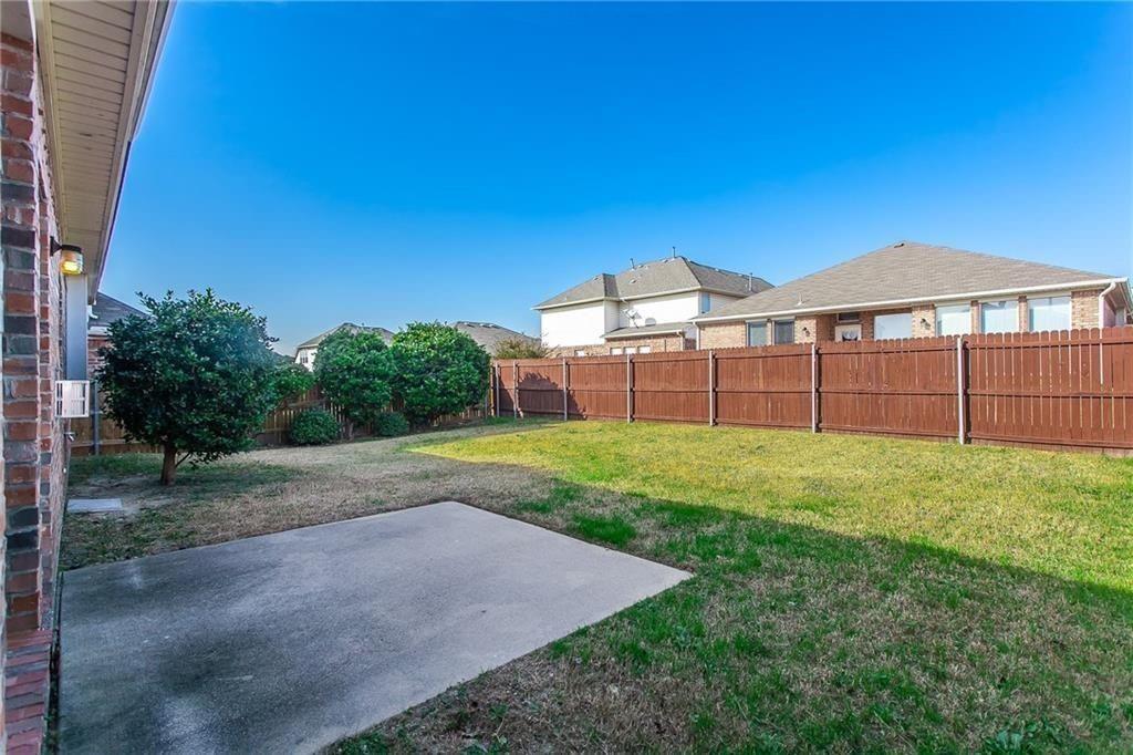 3817 Summersville Lane Fort Worth, TX 76244 - Photo 14 of 18 a view of a green field in front of a house