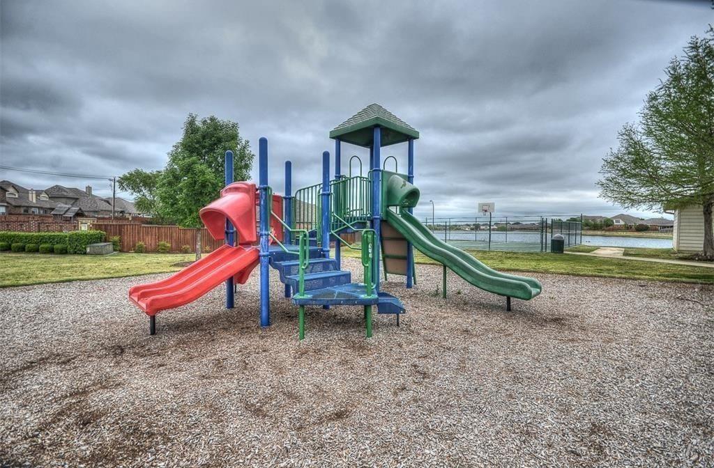 3817 Summersville Lane Fort Worth, TX 76244 - Photo 16 of 18 a view of outdoor space with playground and green space