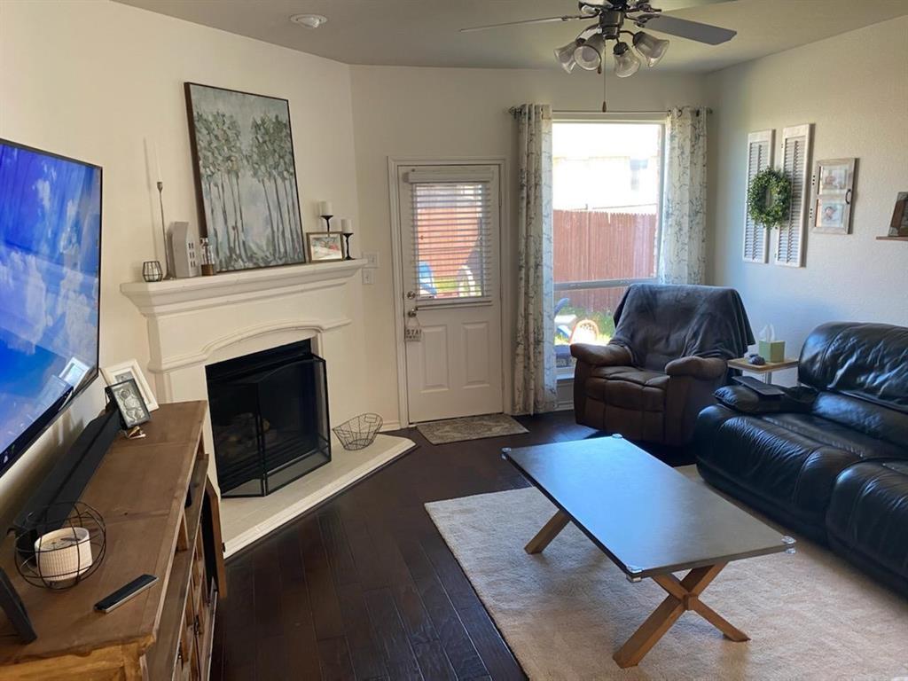 3817 Summersville Lane Fort Worth, TX 76244 - Photo 5 of 18 a living room with furniture and a fireplace