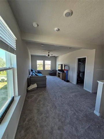 a kitchen with wooden floors and sink