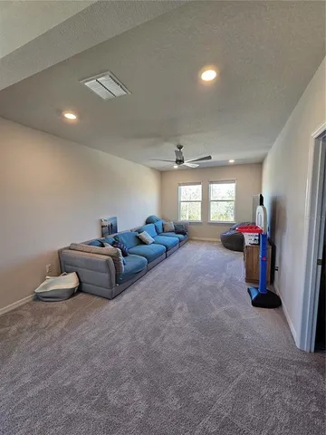 a room with lots of gym equipment and a mirror