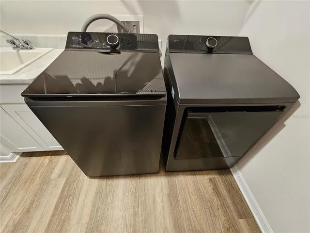 a view of a park with swings and slides