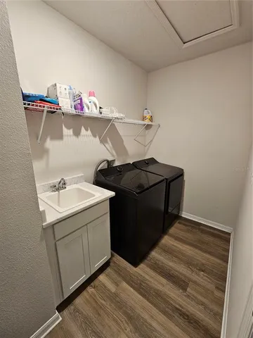 a view of a chairs and table in a patio