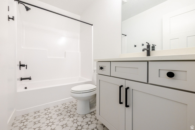 4775 Olive Avenue, Unit 412 Mapleton, UT 84664 - Photo 16 of 19 Full bathroom featuring vanity and shower / bathtub combination