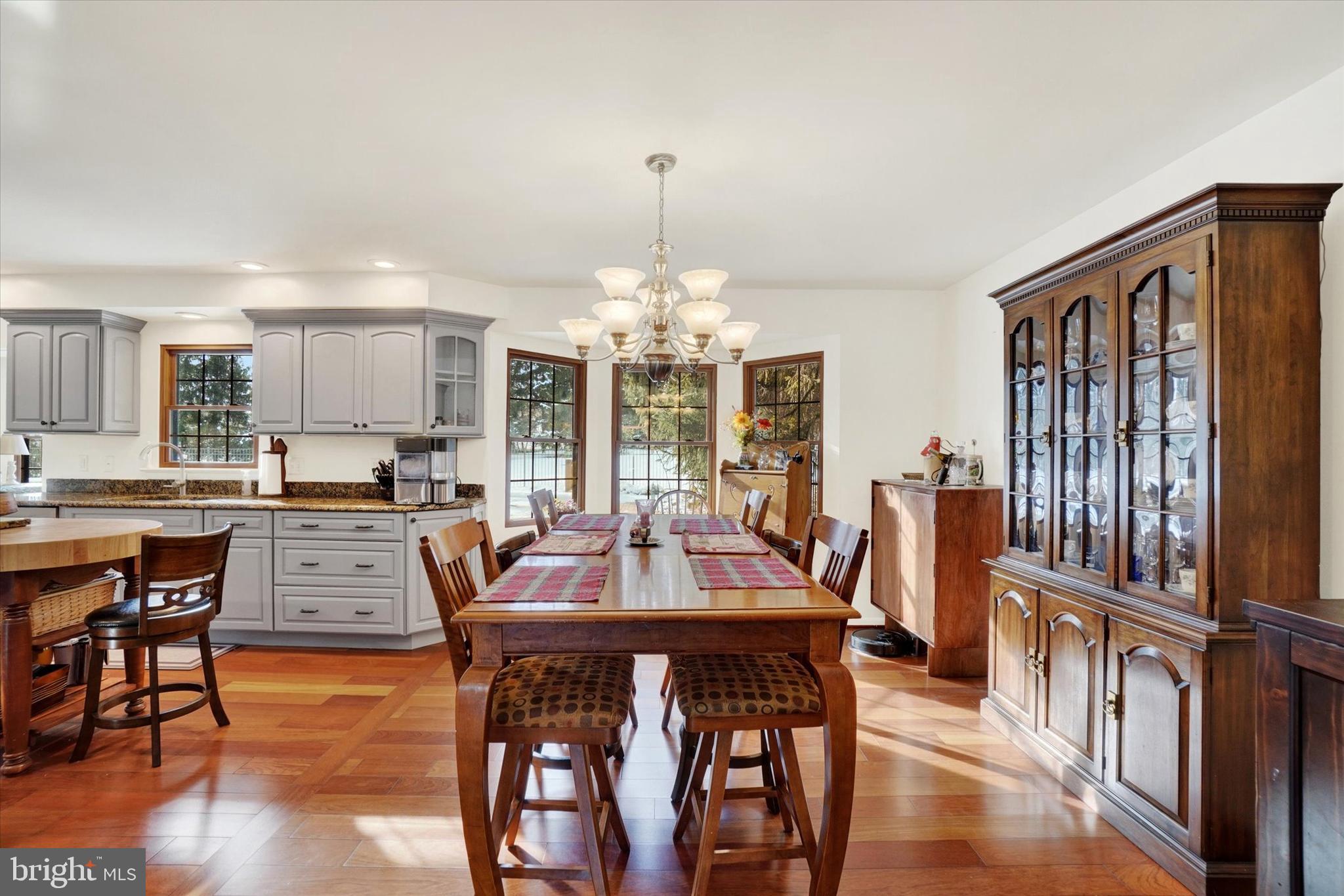 2350 Sutton Road York, PA 17403 - Photo 11 of 37 a view of a dining room with furniture window and wooden floor
