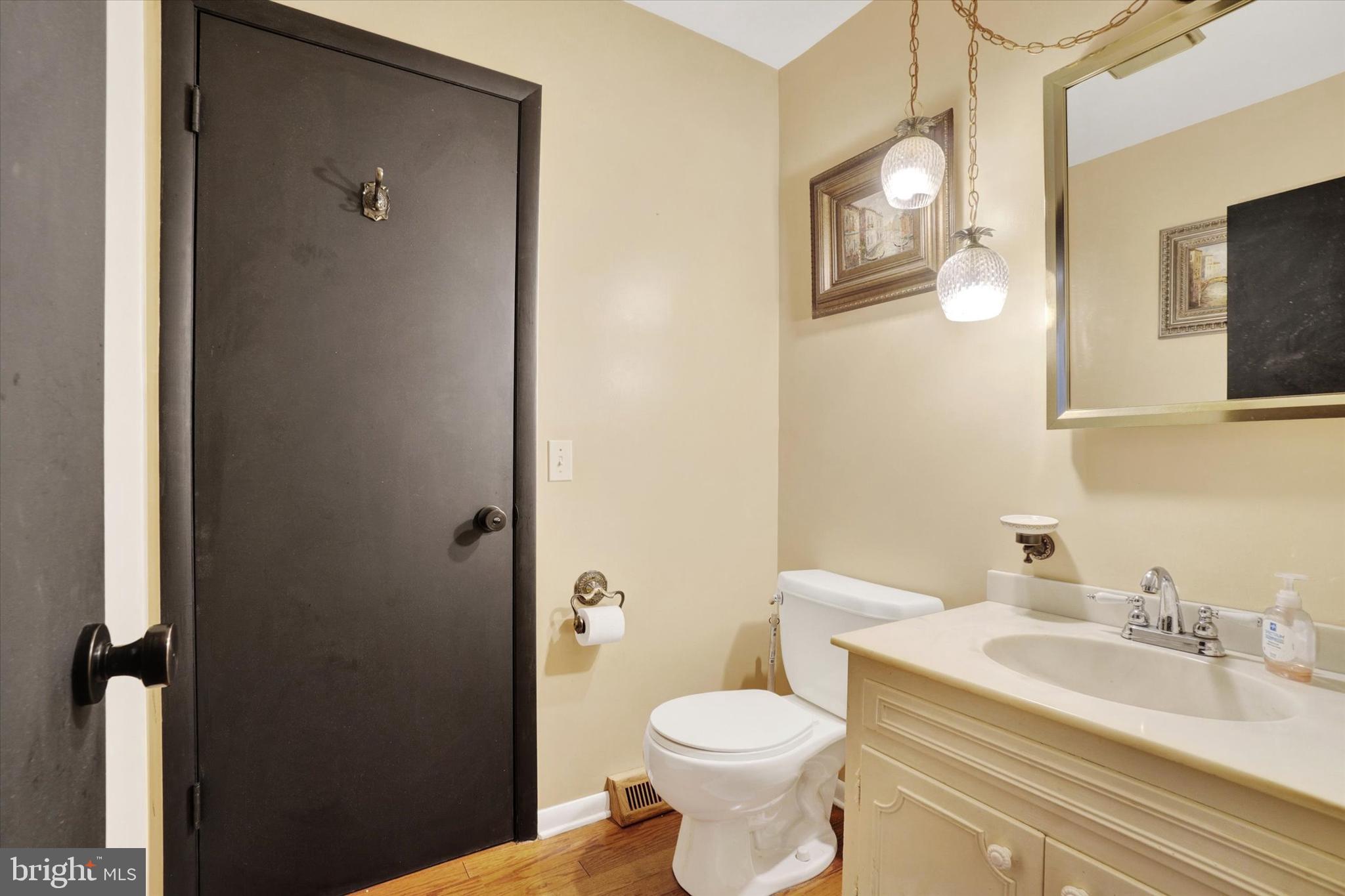 2350 Sutton Road York, PA 17403 - Photo 14 of 37 a white toilet sitting next to a bathroom sink