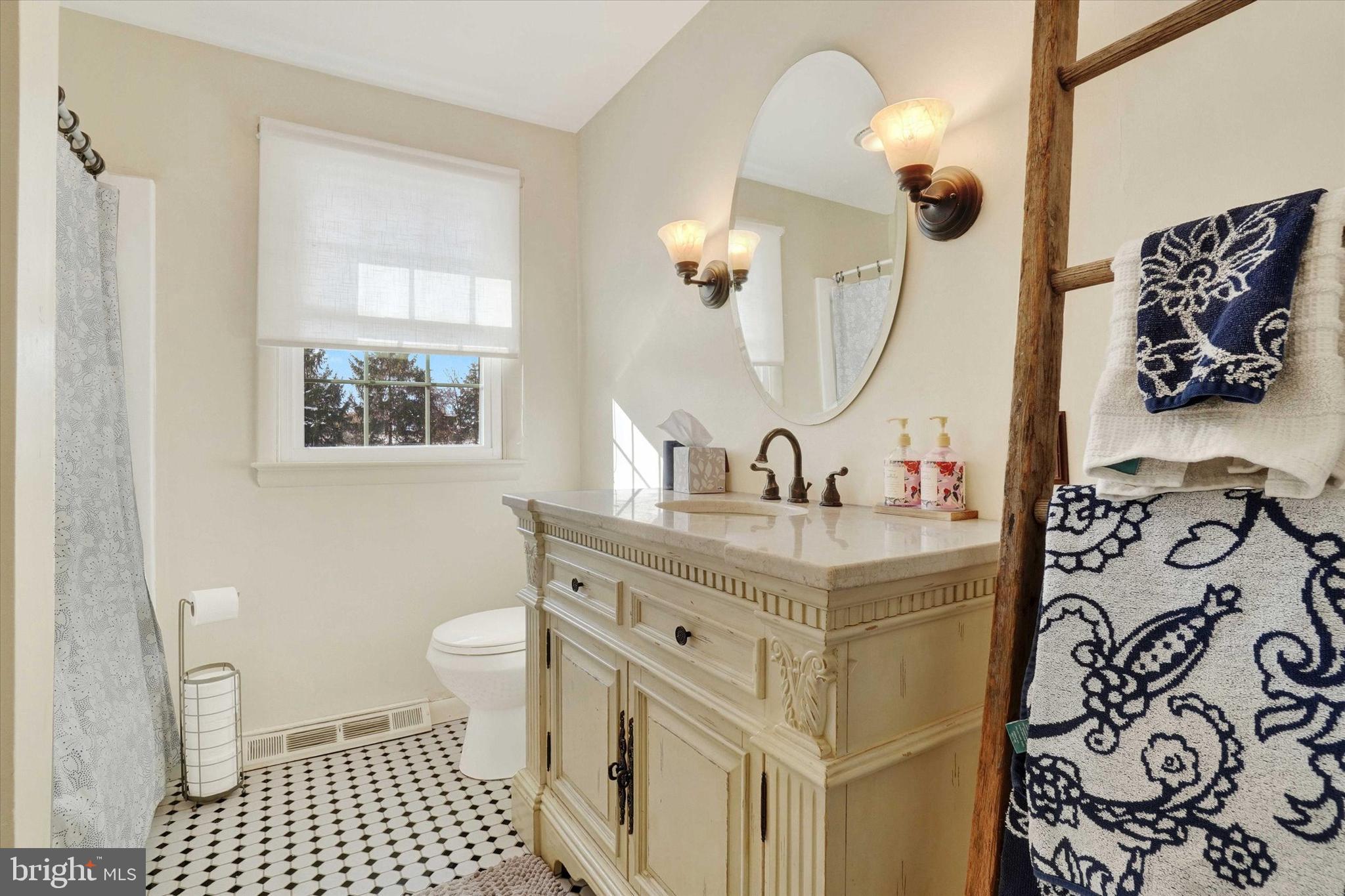 2350 Sutton Road York, PA 17403 - Photo 21 of 37 a bathroom with a sink and a mirror