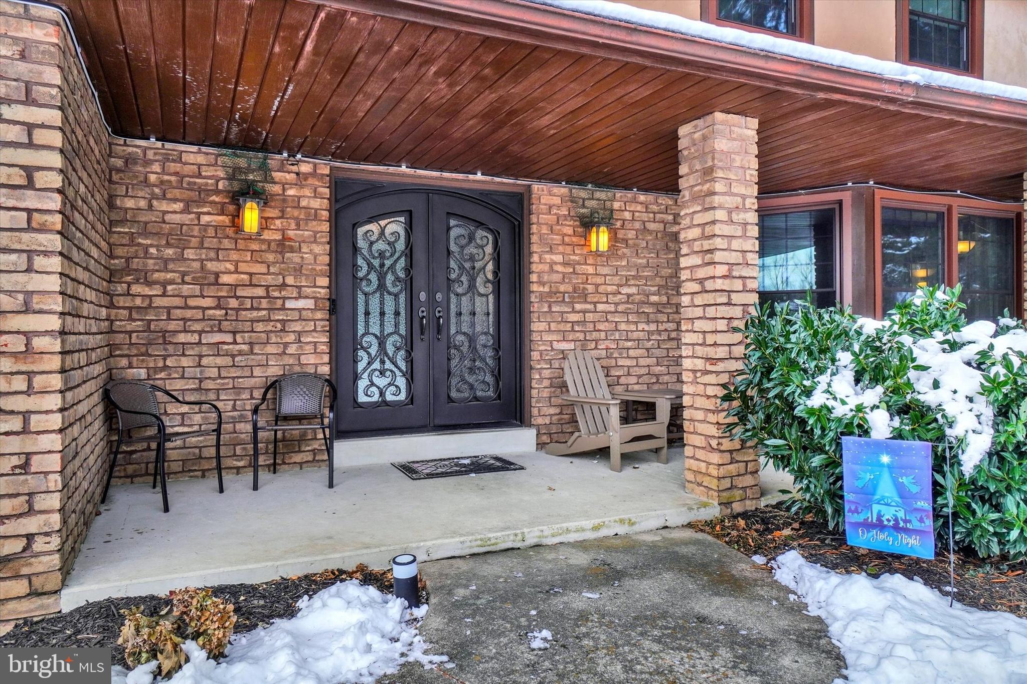 2350 Sutton Road York, PA 17403 - Photo 3 of 37 a brick building with a bench in front of it