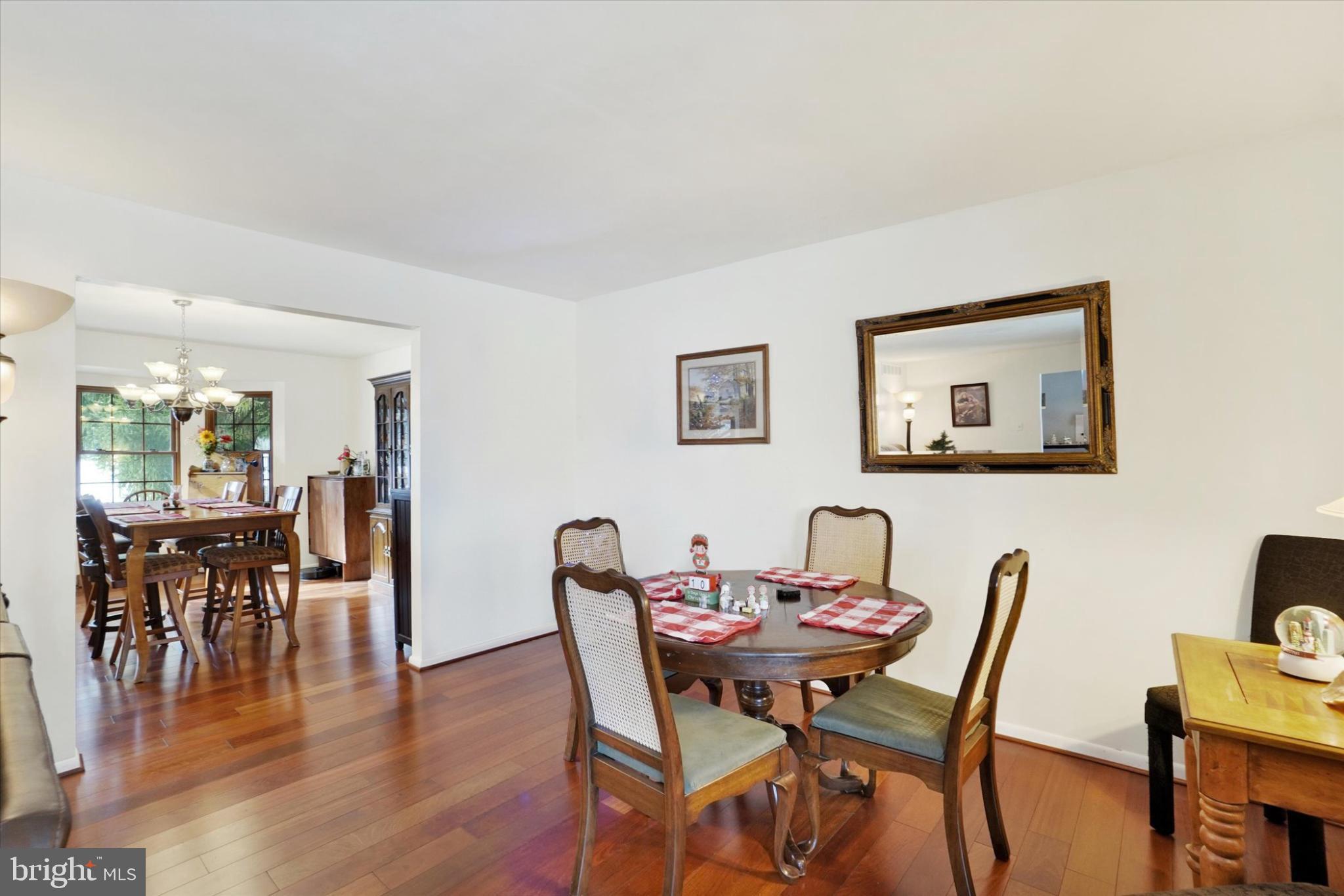2350 Sutton Road York, PA 17403 - Photo 7 of 37 a view of a dining room with furniture and wooden floor