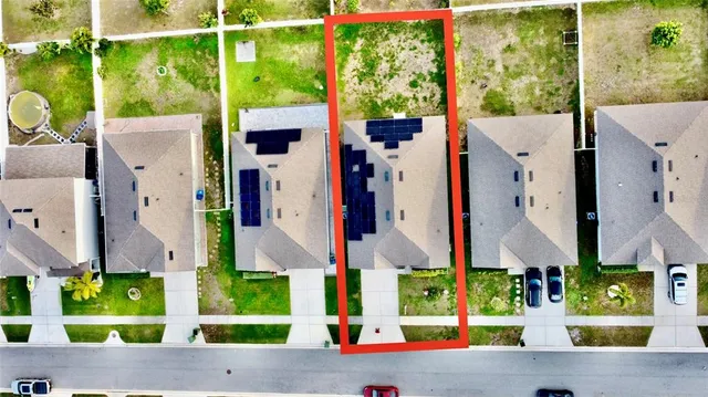 a view of building along with street and seating