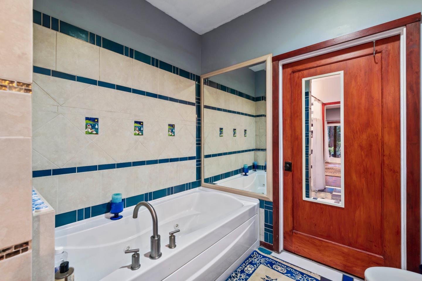 381 Hopkins Gulch Road Boulder Creek, CA 95006 - Photo 27 of 44 a bathroom with a bathtub and a shower