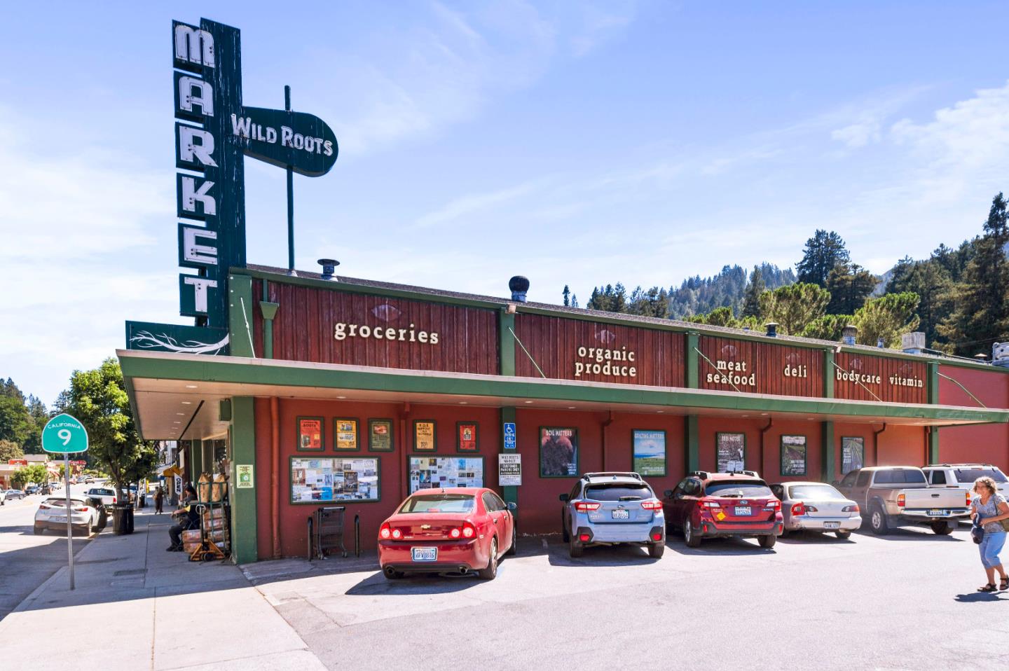 381 Hopkins Gulch Road Boulder Creek, CA 95006 - Photo 35 of 44 a front view of a building with cars parked