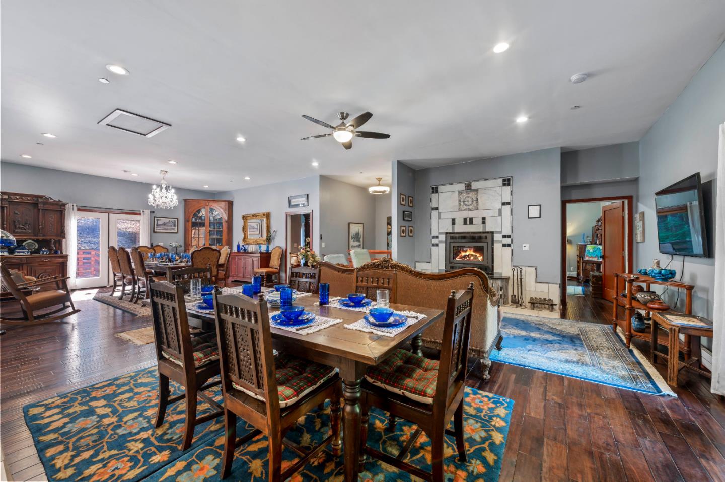 381 Hopkins Gulch Road Boulder Creek, CA 95006 - Photo 8 of 44 a view of a dining room with furniture and wooden floor