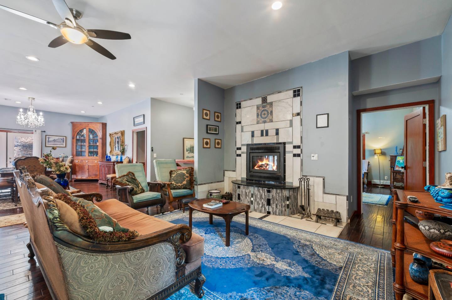 381 Hopkins Gulch Road Boulder Creek, CA 95006 - Photo 9 of 44 a living room with furniture and a fireplace