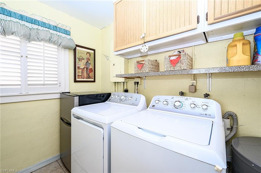 1247 Royal Palm Drive Naples, FL 34103 - Photo 20 of 28 a utility room with dryer and washer