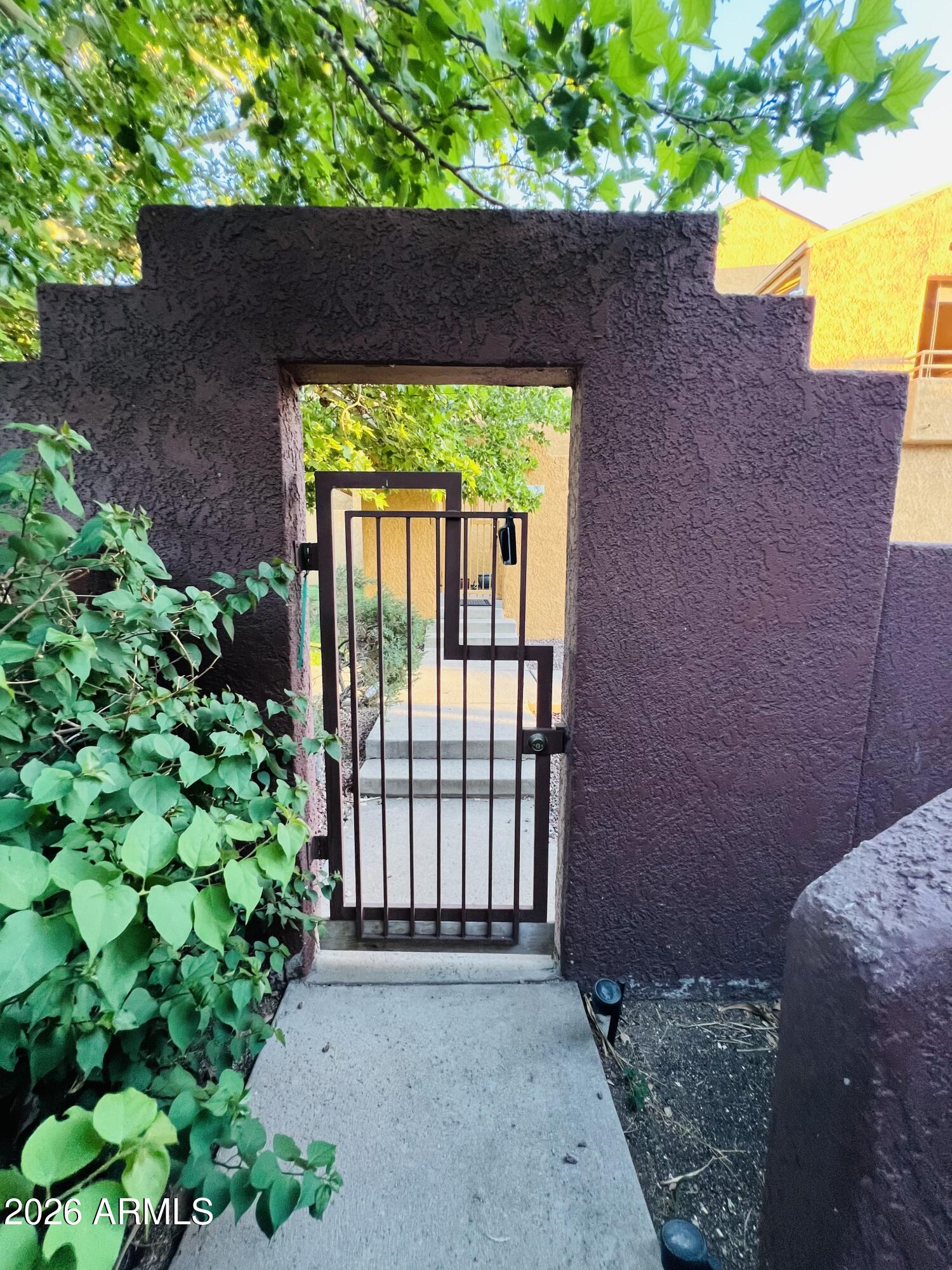 4040 North Weimer Place, Unit 4 Tucson, AZ 85719 - Photo 10 of 12 a view of backyard with a garden