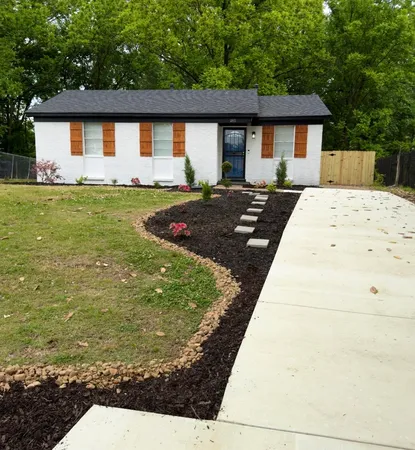 a front view of house with yard